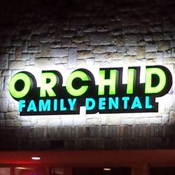 Tiffany Jacob, DDS - Orchid Family Dental - Our Sign at night!