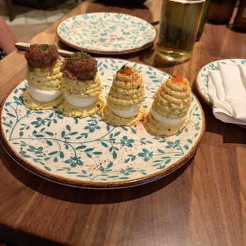 Yardbird - Deviled eggs, really enjoyed them all, the spiced ones on the left were smoky and were the favorite. - Southern Near Me - Las Vegas, Nevada Yardbird - Deviled eggs, really enjoyed them all, the spiced ones on the left were smoky and were the favorite. - Southern Near Me - Las Vegas, Nevada
