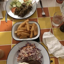 Sunshine Social - Chips in the middle, beef with lemongrass and chilli in the background and Moroccan Lamb Sausages.