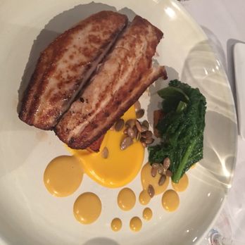 Vestige - Pan seared red fish with pepinos, sweet potatoes and mustard greens - New American Near Me - Ocean Springs, Mississippi Vestige - Pan seared red fish with pepinos, sweet potatoes and mustard greens - New American Near Me - Ocean Springs, Mississippi