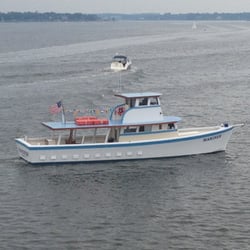 Classic Boat Rides Charter Boat Mariner - Mariner - Navesink River, on her way to the Molly Pitcher Hotel in Red Bank  to pick up an Office Party.