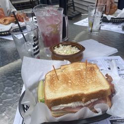 Backdoor Bar & Grille - Club sandwich on the patio.