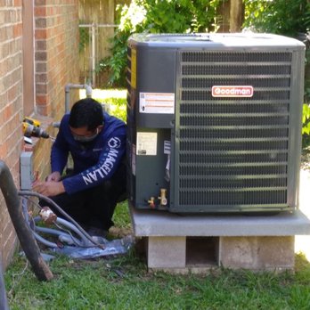 Air Heating & Cooling - George installing new wiring junction box after putting new compressor on raised platform. - Heating & Air Conditioning/HVAC Near Me Air Heating & Cooling - George installing new wiring junction box after putting new compressor on raised platform. - Heating & Air Conditioning/HVAC Near Me