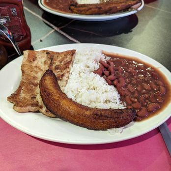 Mr Pollo Bayside - Grilled pork chop with rice, beans and plantains - Spanish Near Me - Bayside, New York