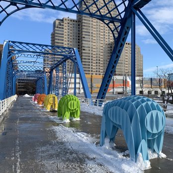 The Blue Bridge - Massimals: Grand Rapids (part of the World of Winter art exhibits in the downtown area) - Landmarks & Historical Buildings Near Me The Blue Bridge - Massimals: Grand Rapids (part of the World of Winter art exhibits in the downtown area) - Landmarks & Historical Buildings Near Me