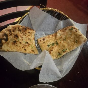 Thali of India - Half eaten naan - Indian Near Me - Rochester, New York Thali of India - Half eaten naan - Indian Near Me - Rochester, New York