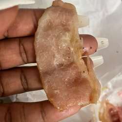 Dunkin' - This bacon is practically raw. I will never order from here again. Never. I should've believed the horrible ratings the first time