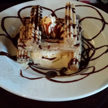 Hola! - Churro's with ice cream drizzled with chocolate sauce. - Peruvian Near Me - Bend, Oregon