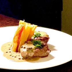 Le Bistro - Steak Frites with Prime Filet Mignon, hand-cut fries and peppercorn cream sauce