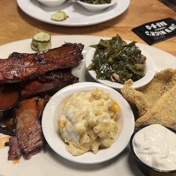Jim 'N Nick's Bar-B-Q - Three Meat Combo plate, Baby Back Ribs, Fried Catfish, and brisket with greens and mac n cheese. - Barbeque Near Me - Smyrna, Georgia Jim 'N Nick's Bar-B-Q - Three Meat Combo plate, Baby Back Ribs, Fried Catfish, and brisket with greens and mac n cheese. - Barbeque Near Me - Smyrna, Georgia