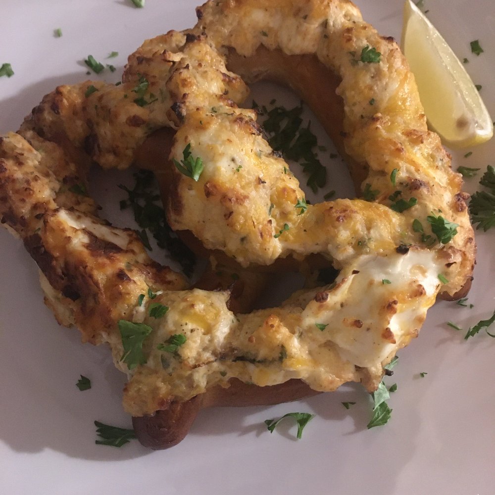 Rusty Hooks Dockside Grill - Spicy crab dip on top of a soft pretzel - Seafood Near Me - Southport, North Carolina Rusty Hooks Dockside Grill - Spicy crab dip on top of a soft pretzel - Seafood Near Me - Southport, North Carolina