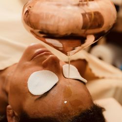 Ayutherapy - Ayurveda Wellness Center - Shirodhara Treatment being performed at Ayutherapy Ayurveda Wellness Center