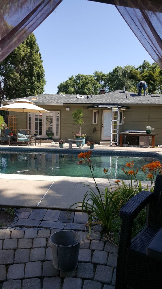 Slide of Green's Roofing