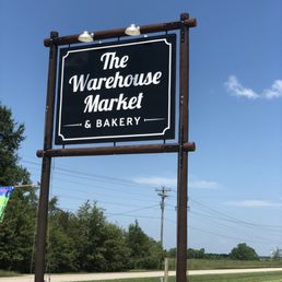 a sign for the warehouse market and bakery a sign for the warehouse market and bakery