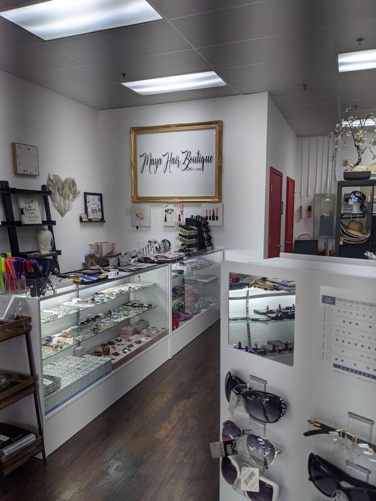 Maya Hair Boutique & Beauty Supply Logo