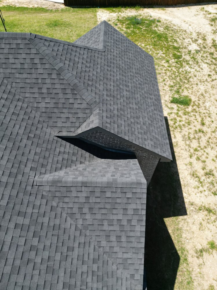 Slide of Taylored Roofing
