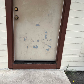 Monte Bianco - Peeling paint on door, weeds growing up through cracks - Hotels Near Me - Mount Shasta, California Monte Bianco - Peeling paint on door, weeds growing up through cracks - Hotels Near Me - Mount Shasta, California