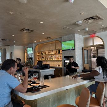 Gloria's Latin Cuisine - Bar area has seating for eating too - Tex-Mex Near Me - Prosper, Texas Gloria's Latin Cuisine - Bar area has seating for eating too - Tex-Mex Near Me - Prosper, Texas