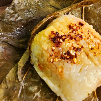 Get Sum Dim Sum - Delicious Sticky Rice Dish is rice and Chinese sausage wrapped in fragrant leaves then steamed together. Such a delicate flavor. - Dim Sum Near Me - Ontario, California Get Sum Dim Sum - Delicious Sticky Rice Dish is rice and Chinese sausage wrapped in fragrant leaves then steamed together. Such a delicate flavor. - Dim Sum Near Me - Ontario, California