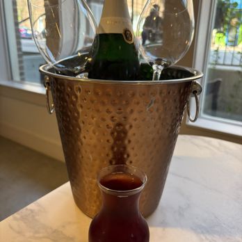 Loona's Cafe - Mimosa bottle. - Coffee & Tea Near Me - Huntsville, Alabama