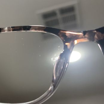 Solace Optometry - A close-up image of eyeglasses with a tortoiseshell frame, with a ceiling vent visible in the blurred background. - Eyewear & Opticians Near Me - Murrieta, California