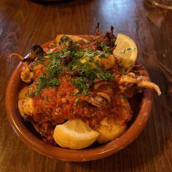 Palo Tapas Bar - Calamares a la Parrilla / Grilled Calamari - $16 Grilled R.I. calamari / cherry pepper & caper sauce / potatoes - Tapas Bars Near Me - Providence, Rhode Island