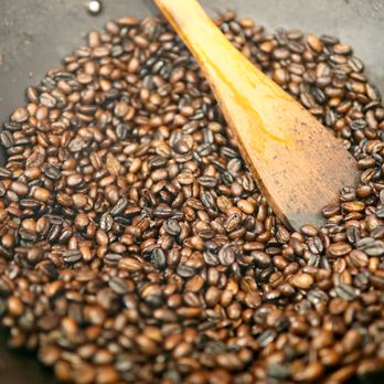 Adey Abeba Ethiopian Restaurant - roasted coffee beans in a wok - Ethiopian Near Me - Seattle, Washington
