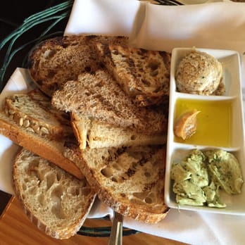 Bluebeard - Bread with anchovy butter(my fav), garlic oil(wife's fav), and charred onion butter - New American Near Me - Indianapolis, Indiana Bluebeard - Bread with anchovy butter(my fav), garlic oil(wife's fav), and charred onion butter - New American Near Me - Indianapolis, Indiana