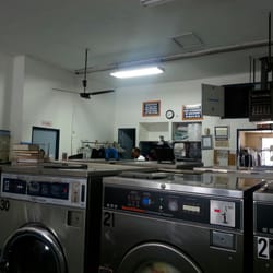Nick's Laundry & Dry Cleaning - Dry cleaning available, Mr. Lee (the owner) in the background