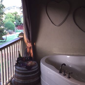Paso Robles Inn - Wine, cheese and nut platter and the hot tub over looking the garden - Hotels Near Me - Paso Robles, California Paso Robles Inn - Wine, cheese and nut platter and the hot tub over looking the garden - Hotels Near Me - Paso Robles, California
