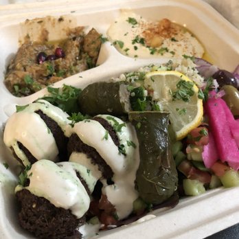 Tahina - Mezze Sampler | falafel (3), hummus, eggplant dip, dolma (1), quinoa tabouli, olives, pickles, fresh baked pita - Mediterranean Near Me - Alameda, California Tahina - Mezze Sampler | falafel (3), hummus, eggplant dip, dolma (1), quinoa tabouli, olives, pickles, fresh baked pita - Mediterranean Near Me - Alameda, California