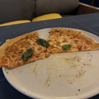 Palma Ristorante - Half eaten margherita pizza - Steakhouses Near Me - Burbank, California Palma Ristorante - Half eaten margherita pizza - Steakhouses Near Me - Burbank, California