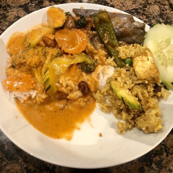 Thai Basil Express - Plate with pineapple fried rice, mussamun curry and eggplant tofu - Thai Near Me - Dublin, California Thai Basil Express - Plate with pineapple fried rice, mussamun curry and eggplant tofu - Thai Near Me - Dublin, California