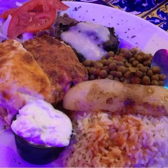 Hellas Restaurant - This was the combination platter. It had gyro meat, mousaka, dolmades, peas, rice, and tzatziki sauce. I highly recommend this! - Bakeries Near Me - Tarpon Springs, Florida