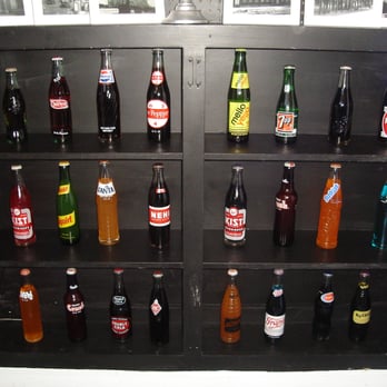 Ricos World Kitchen - Old Soda Bottle Collection - New American Near Me - Buford, Georgia