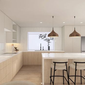 Pacent Construction - White kitchen with light wood touches - General Contractors Near Me Pacent Construction - White kitchen with light wood touches - General Contractors Near Me