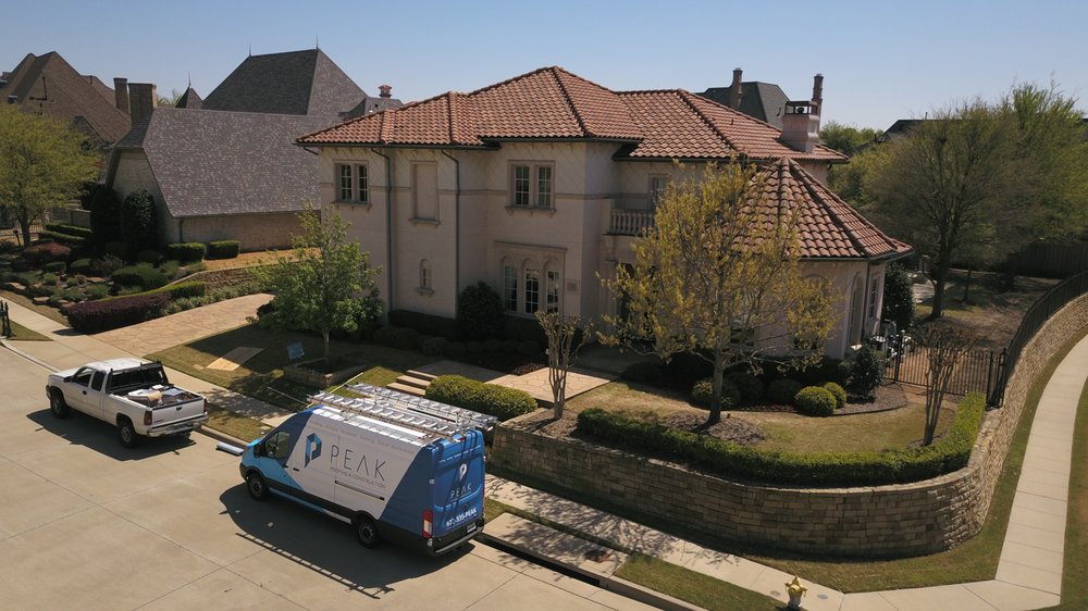 Slide of Peak Roofing & Construction