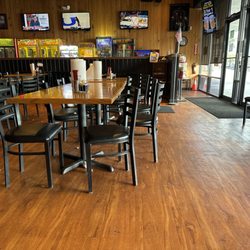 Beef 'O' Brady's - Trash  and food on the floor.