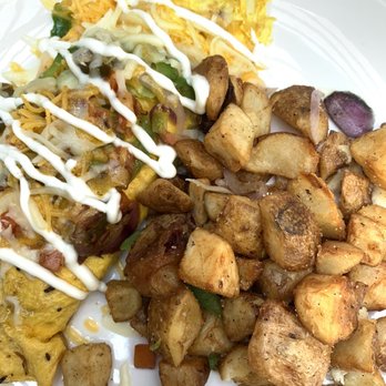 Toast Kitchen & Bar - Spanish omelette, side of country potatoes - Breakfast & Brunch Near Me - Brea, California Toast Kitchen & Bar - Spanish omelette, side of country potatoes - Breakfast & Brunch Near Me - Brea, California