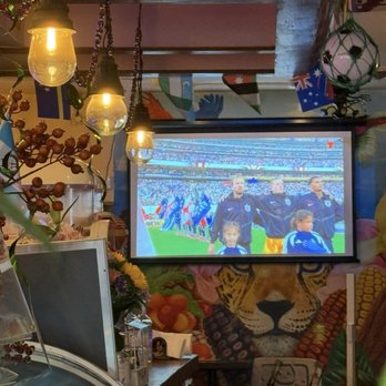 Ix Restaurant - Interior with the World Cup playing - Coffee & Tea Near Me - Brooklyn, New York Ix Restaurant - Interior with the World Cup playing - Coffee & Tea Near Me - Brooklyn, New York