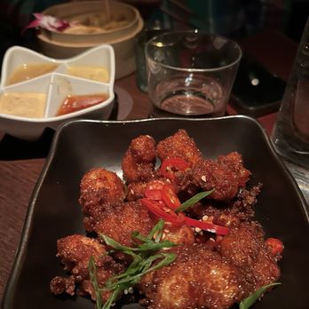 The Bamboo Room at Three Dots and a Dash - Chicken bites with some scrumptious sauces - Tiki Bars Near Me - Chicago, Illinois The Bamboo Room at Three Dots and a Dash - Chicken bites with some scrumptious sauces - Tiki Bars Near Me - Chicago, Illinois