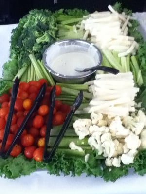 Photo of Mega Bites - Moffett Field, CA, US. Veggie platter with jicama sticks, cauliflower, celery, broccoli and cherry tomatoes, plus ranch dressing