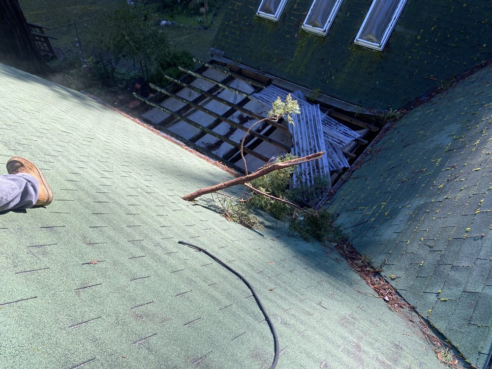 Slide of Luis Roofing