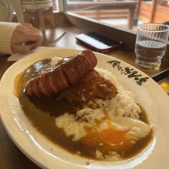 Oretachi Curry - Pork Katsu Curry (with added sausage and onsen egg) - Japanese Near Me - Richmond, British Columbia Oretachi Curry - Pork Katsu Curry (with added sausage and onsen egg) - Japanese Near Me - Richmond, British Columbia