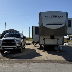 Holly Beach RV Park - 42 foot 5th wheel RV and truck in RV site.