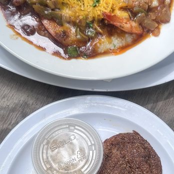 Grits N' Gravy - Fried green tomatoes and Uptown Shrimp N' Grits. - Southern Near Me - Portland, Oregon Grits N' Gravy - Fried green tomatoes and Uptown Shrimp N' Grits. - Southern Near Me - Portland, Oregon