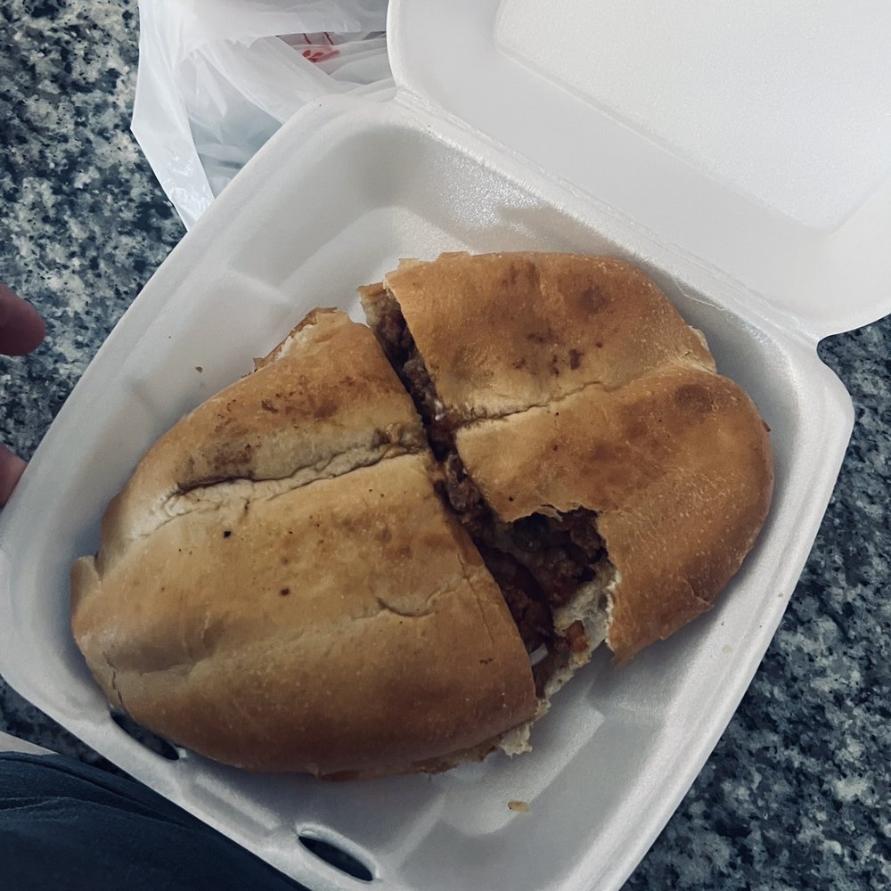 The Al pastor torta minus one bite The Al pastor torta minus one bite