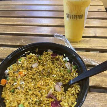 Sovereign - Golden Curry Pineapple Fried Rice with Shrimp. Very bland. Zero flavor. $18 for this bowl?The Mango smoothie only did justice. - Poke Near Me - Miami, Florida