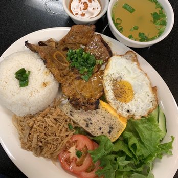 HU TIU MI S45 - Pork chop combination rice platter $8.95 - Vietnamese Near Me - Houston, Texas HU TIU MI S45 - Pork chop combination rice platter $8.95 - Vietnamese Near Me - Houston, Texas