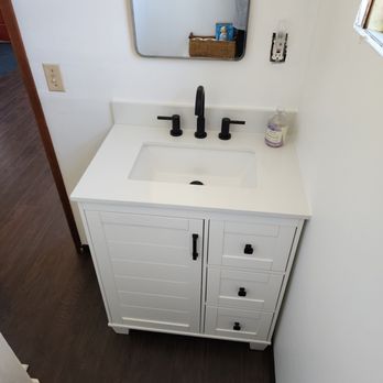 Modern Homes Construction - Bathroom vanity install, plumbing, drywall, painting - General Contractors Near Me